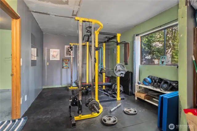 Huge bonus space on lower level with endless possibilities, currently being utilized as an office & weight room