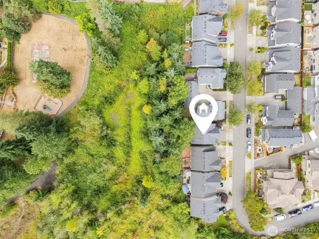 Aerial view of home showcasing private backyard.