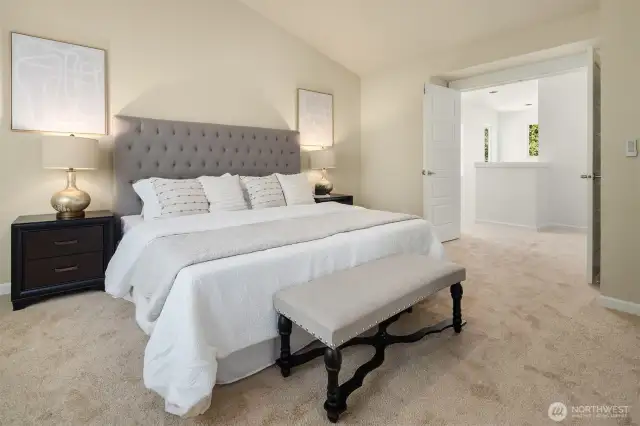 Primary bedroom with French doors.
