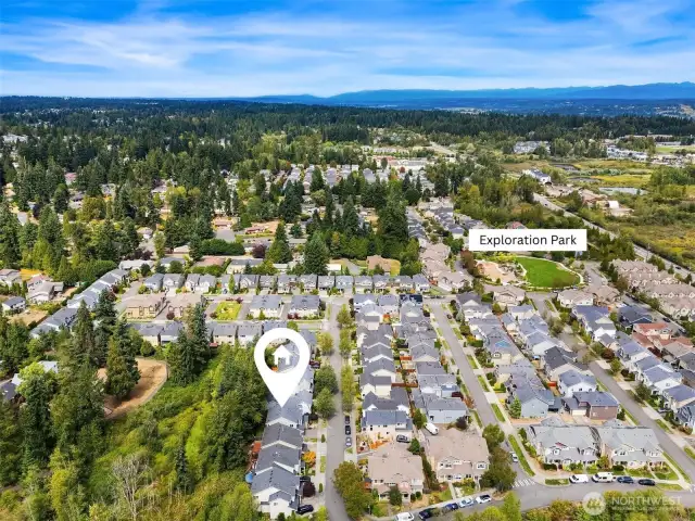 Aerial view of home showcasing close proximity to Exploration Park.
