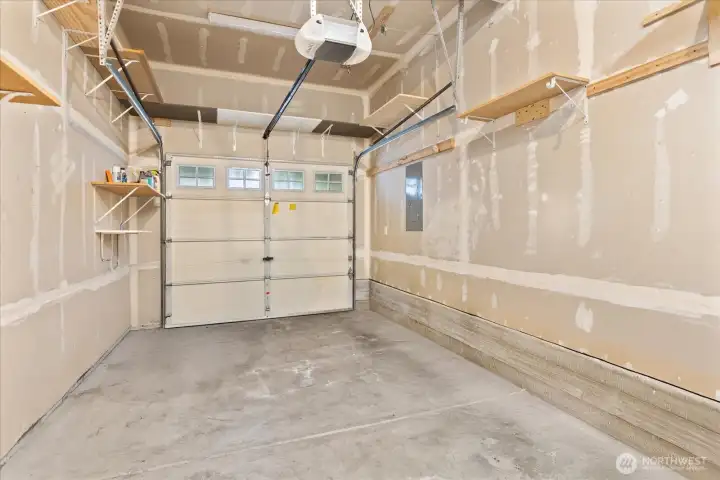Attached garage with storage.