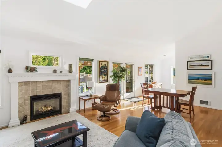 View from the living room includes a dining area on the way to the kitchen.