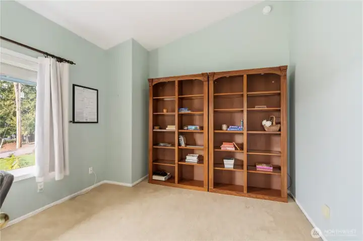 Den or office. (Bookcases are not built-in.)