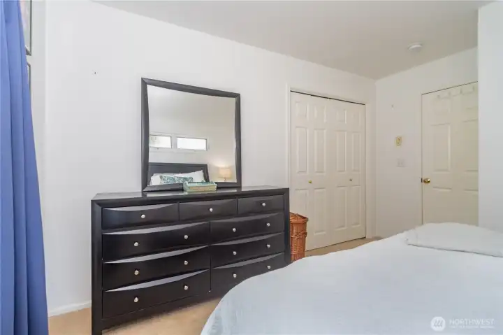 Primary bedroom has a closet with bi-fold doors. Built-in shelving is useful.