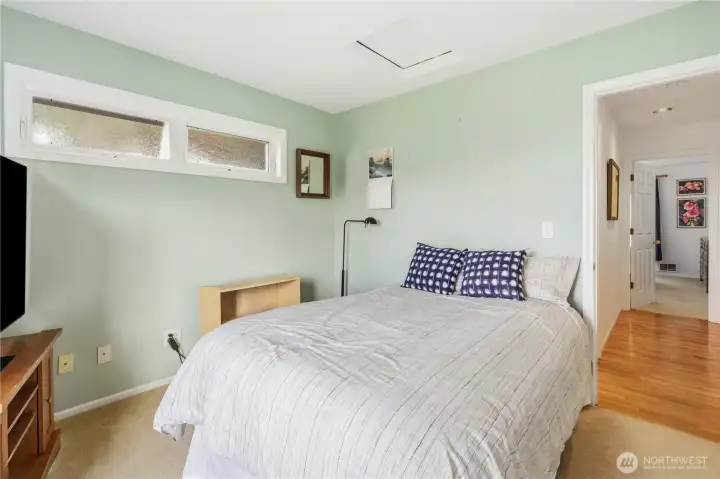 Second bedroom and view of the hall.
