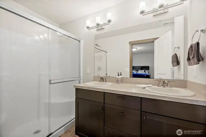 With double vanity, double-wide shower.