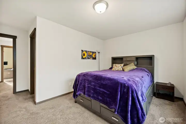 Another view of the primary towards the walk-in closet.