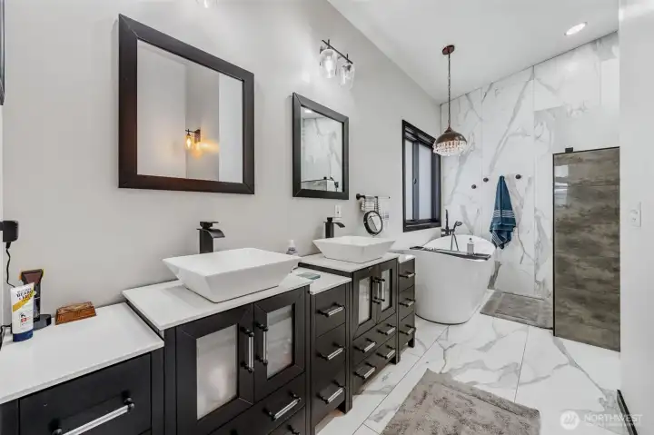 Primary bathroom is a dream!  Has a walk-in closet and access to the laundry.....you need to see this!!!