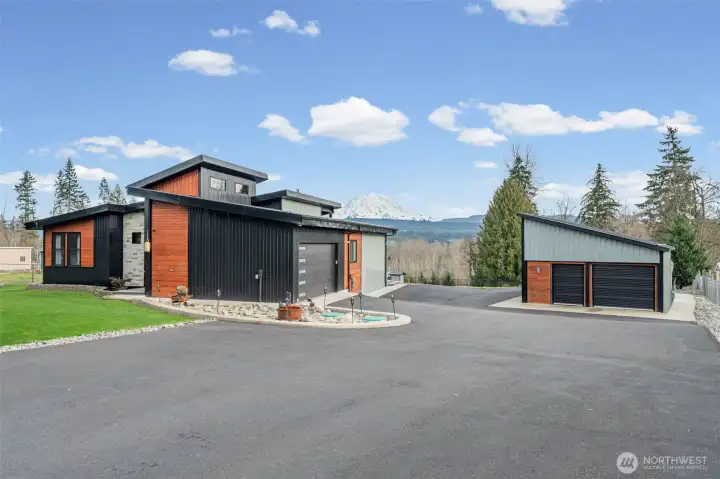 Perfect asphalt, concrete edging, grid perimeter fence...yes, they thought of everything!