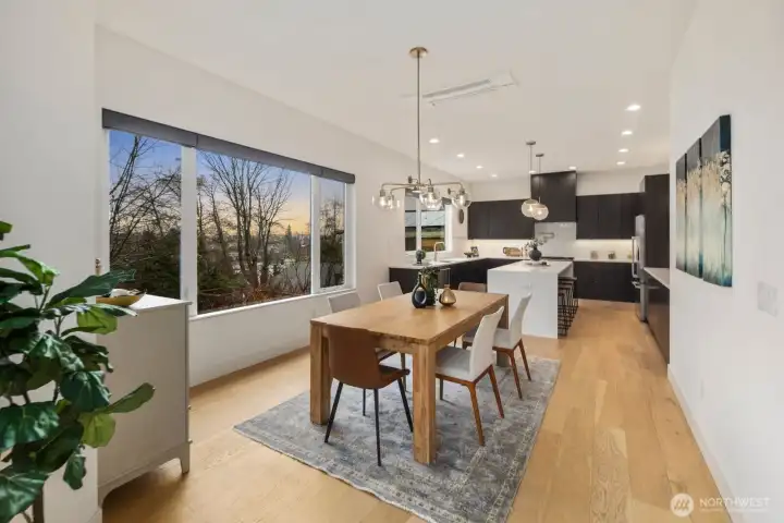 Dining area windows with Lutron system blinds