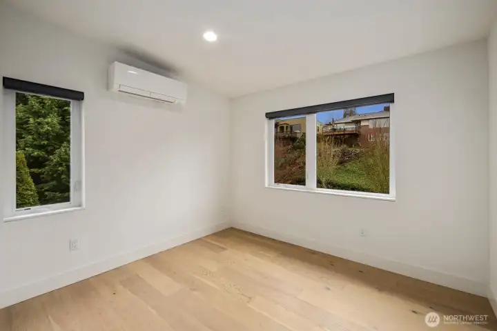 Additional bedroom with natural light and mini split