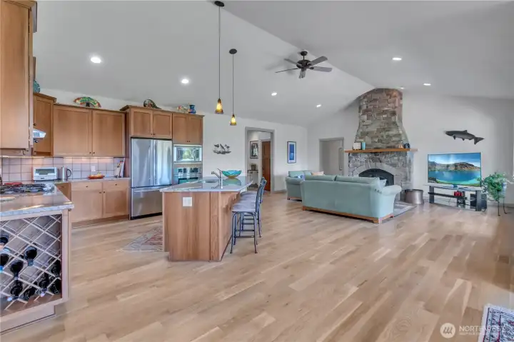 Gourmet kitchen features luxury appeal and ease in living accented with new white oak hardwoods - impeccable!