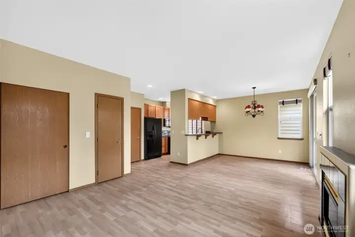 Open-concept design creates a seamless flow between living, dining, and kitchen spaces.