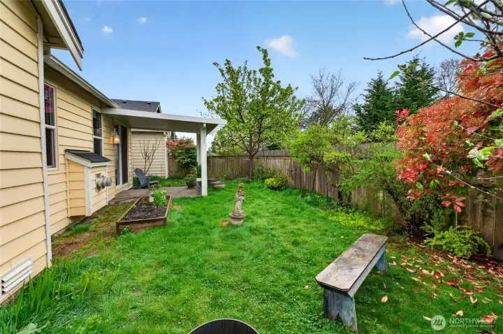 Private, fully fenced backyard backing to open common space, room to relax without the upkeep.