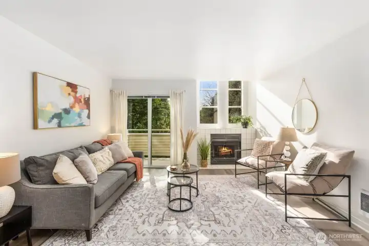 West facing living room with large windows and patio provide lots of light