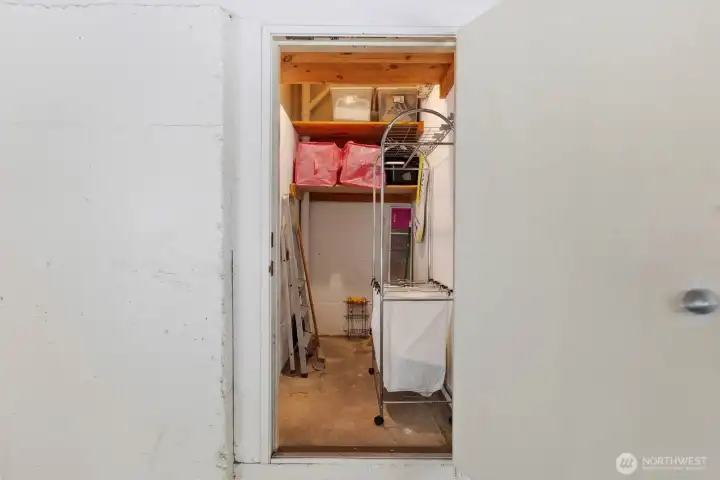 Large storage unit directly in front of underground parking space