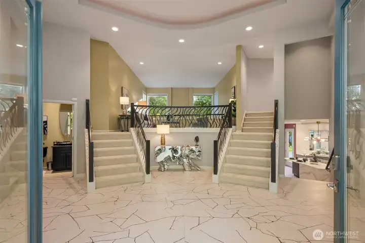 A beautifully renovated entry welcomes you into this spectacular multi-level home, highlighted by heated porcelain Kintsugi flooring.
