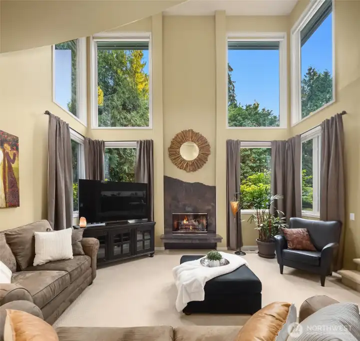 Soaring ceilings complemented by motorized interior and exterior shades.
