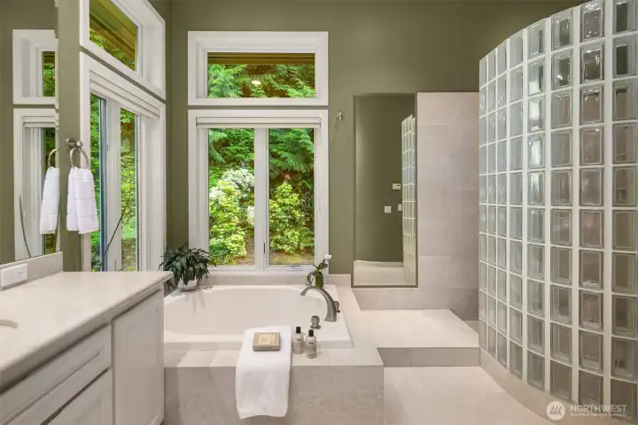 Dramatic glass wall, and heated floors for year-round comfort.