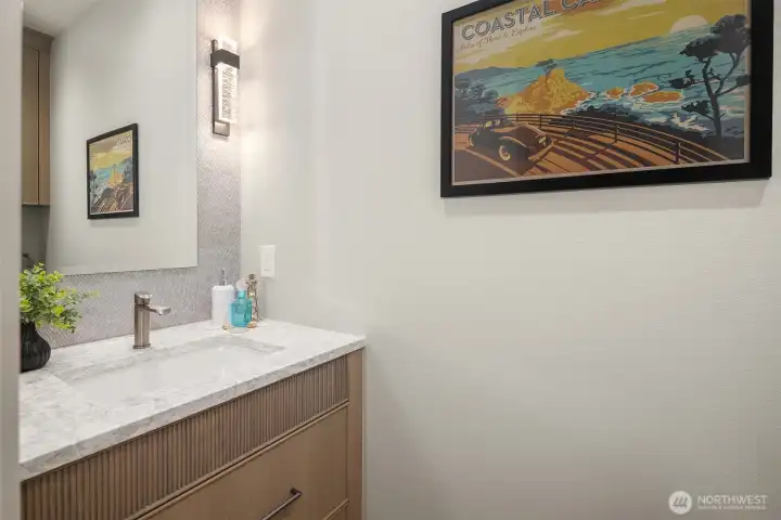 Convenient powder room located near the laundry area