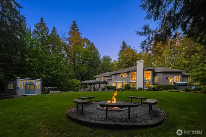Detached, insulated, and connected outbuilding provides ideal space for a home office, art studio, or guest retreat.