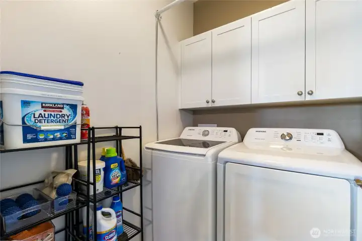 Laundry off hallway by primary