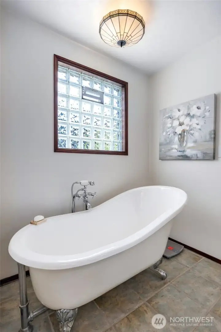 Large soaking tub in the primary bathroom.
