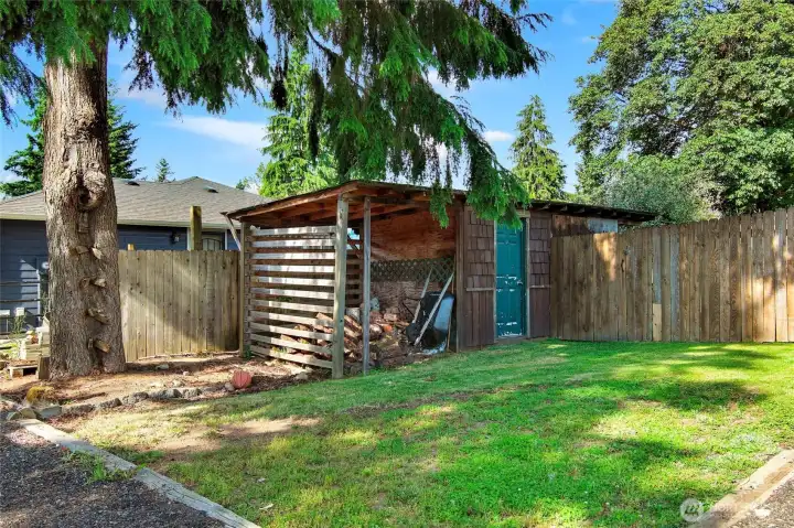 Wood shed and workshop space/garden storage.