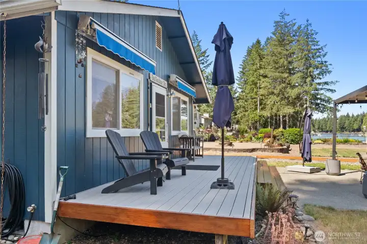 Trex Deck off the home with retractable awnings.