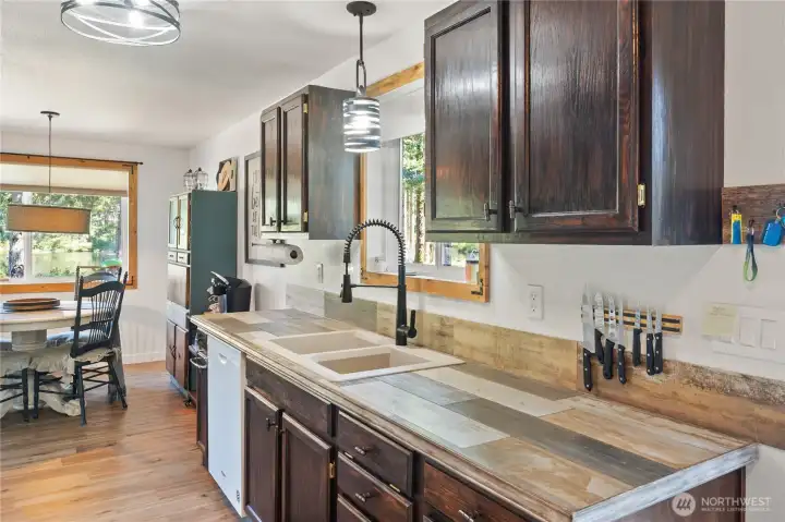Kitchen leads to dining room.