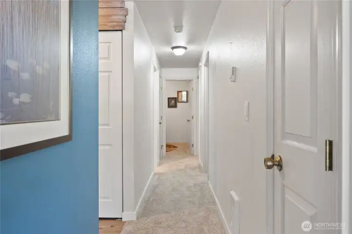 Hallway with closets for storage