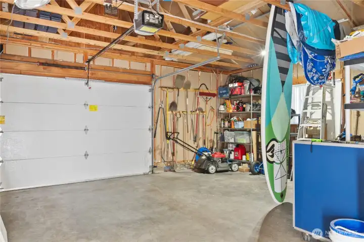 Garage with a shop are - bring your toys here and have fun. Extra large single car garage.