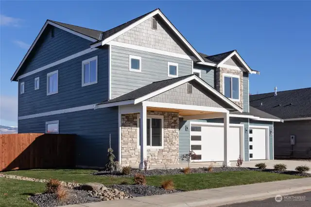 Fully landscaped front yard with sprinkler system