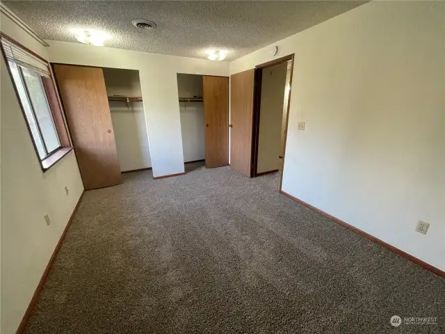 Bedroom with double closets