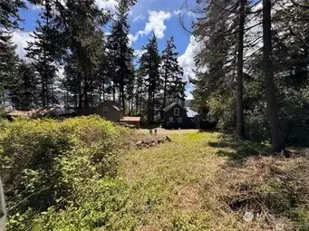 This .22 acre parcel is ready to build with Eastsound Water User's membership in place and electric to the property line.