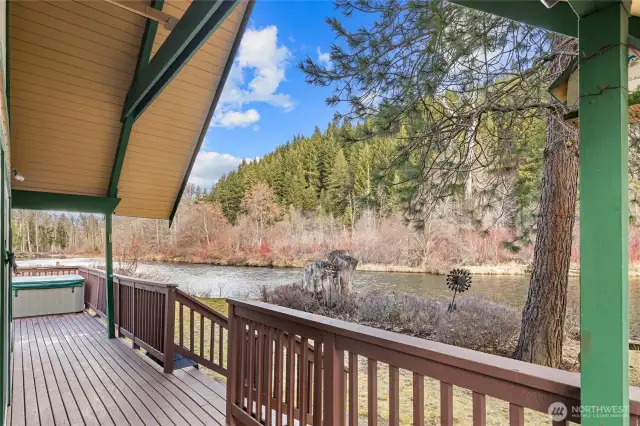 Covered deck overlooking the river!