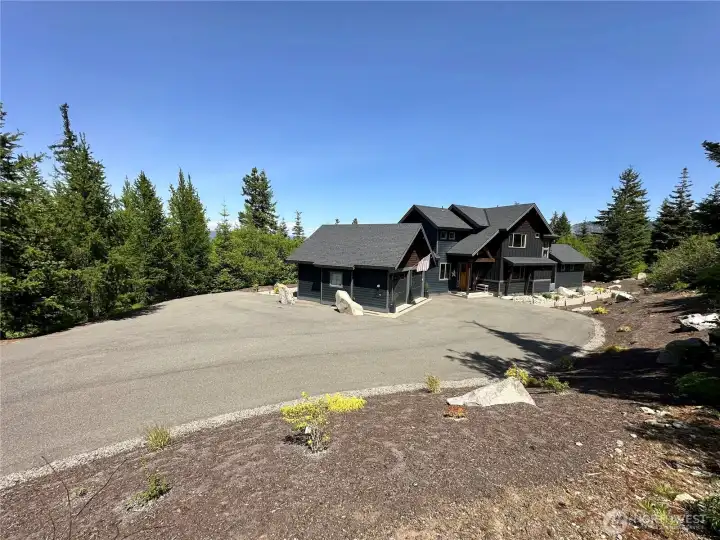 Extended asphalt driveway - one of the largest in the neighborhood.  Plenty of parking!
