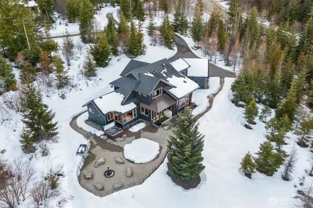 Overhead of the home in the snow.