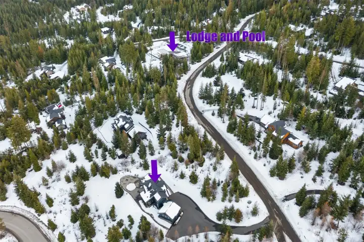 Also a benefit of this home's location is the close proximity to the community pool and lodge. It's just a short walk down the road.