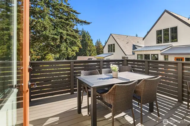 Step out to the large, upper level terrace just steps from the kitchen, living and dining room.