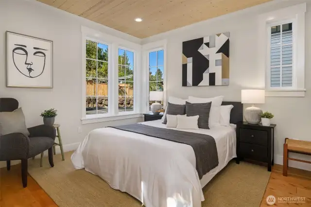 A generous main floor primary ensuite bedroom allows for single level living.
