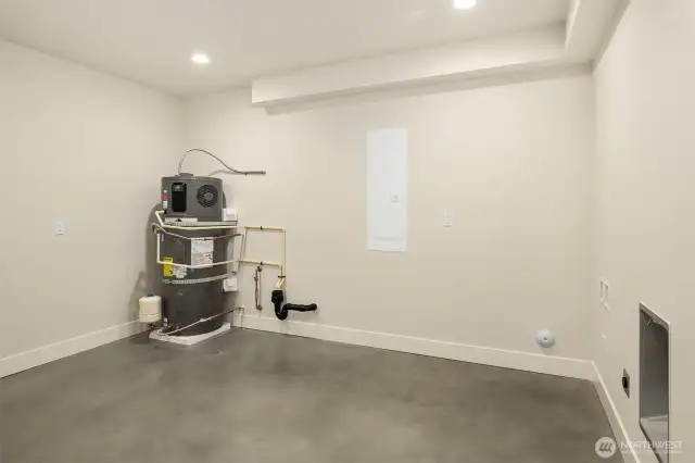 The lower level includes a very large utility storage space with room for a washer/dryer and lots of storage!
