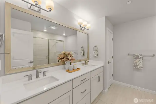 Primary bathrooms with dual vanity