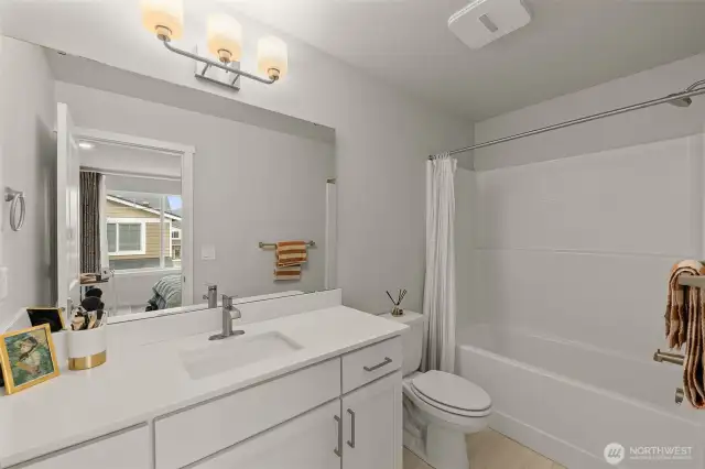 With adjacent full bath