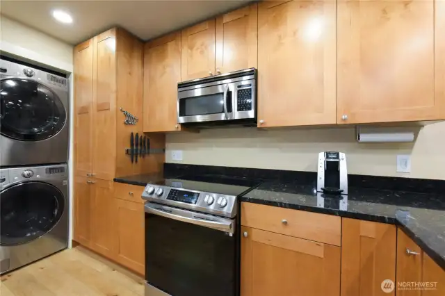 The built-in microwave and electric range offer a clean, cohesive look offering both convenience and function.