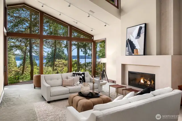 Anchored by a cozy gas fireplace, the great room is the home’s crown jewel, with soaring ceilings and strategically positioned windows that bathe the space in natural light.