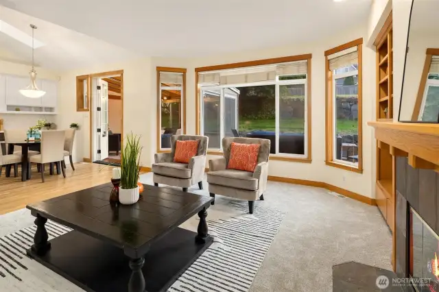 Cozy family room with built-ins and warm, inviting charm.