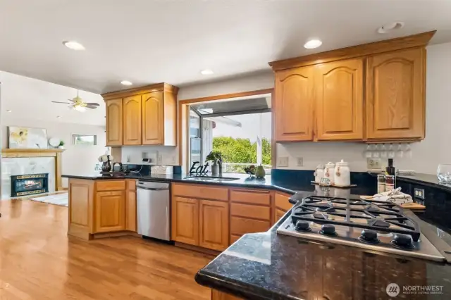 Rounded breakfast bar, Plenty of cabinets & pantry, Granite counters ...