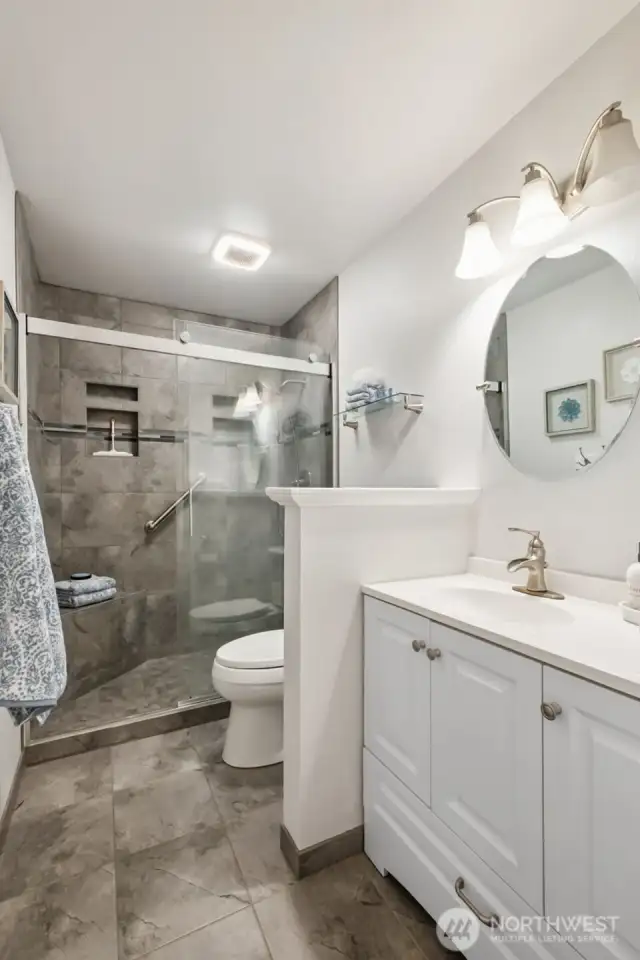Updated lower level 3/4 bathroom with large walk-in shower!