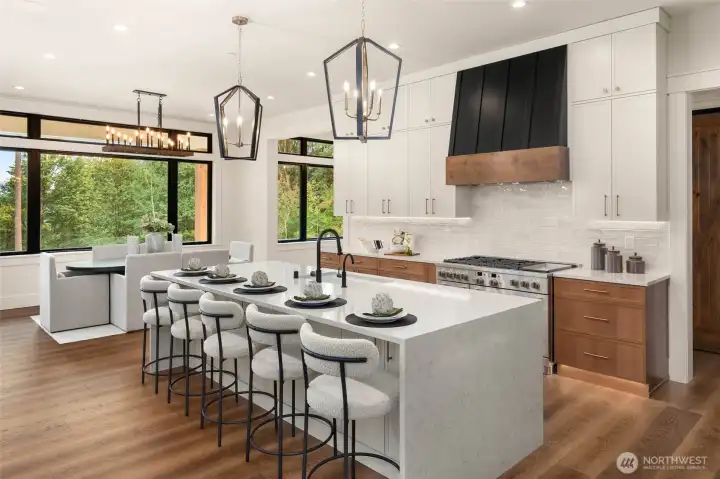 custom cabinetry with waterfall edge counters.
